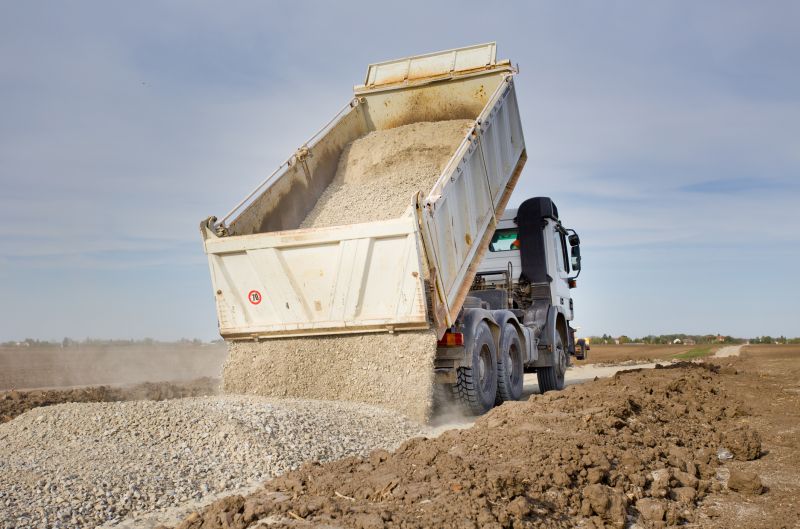 Delivery Trucks Loading Gravel