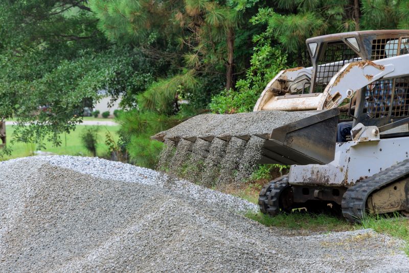 Heavy Equipment Spreading Gravel